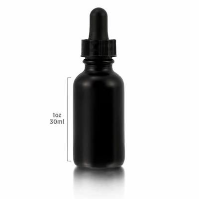La bouteille en verre noire de l'oeil 30ml cosmétique avec le compte-gouttes se renversent non